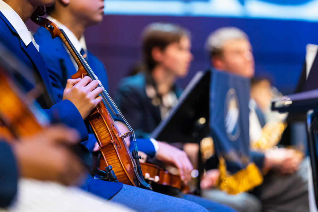 Student holding a violin