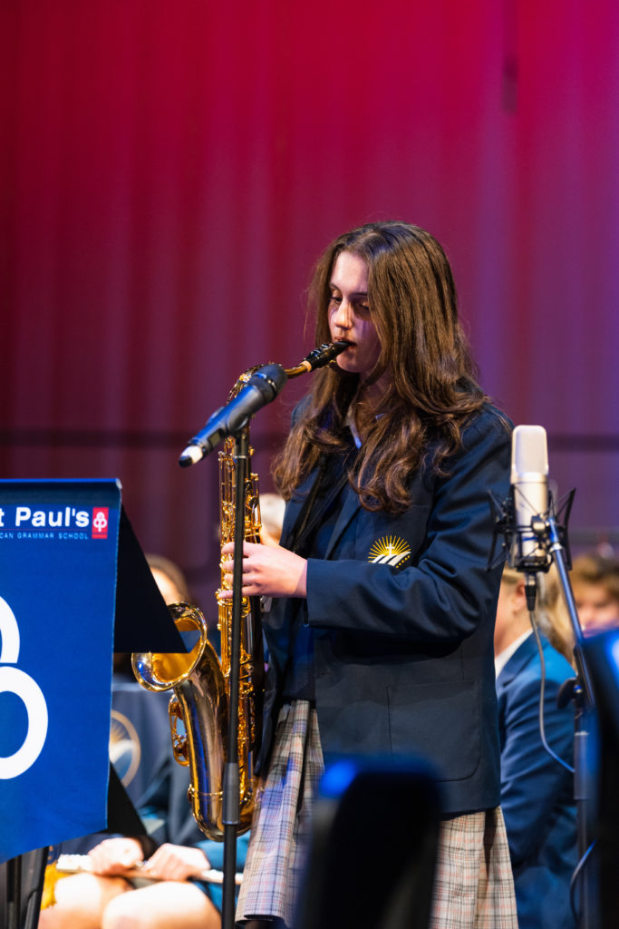 Girl playing a saxophone